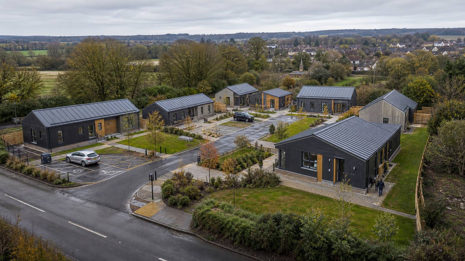 Low-rise modular development arranged around access, landscape and shared service space